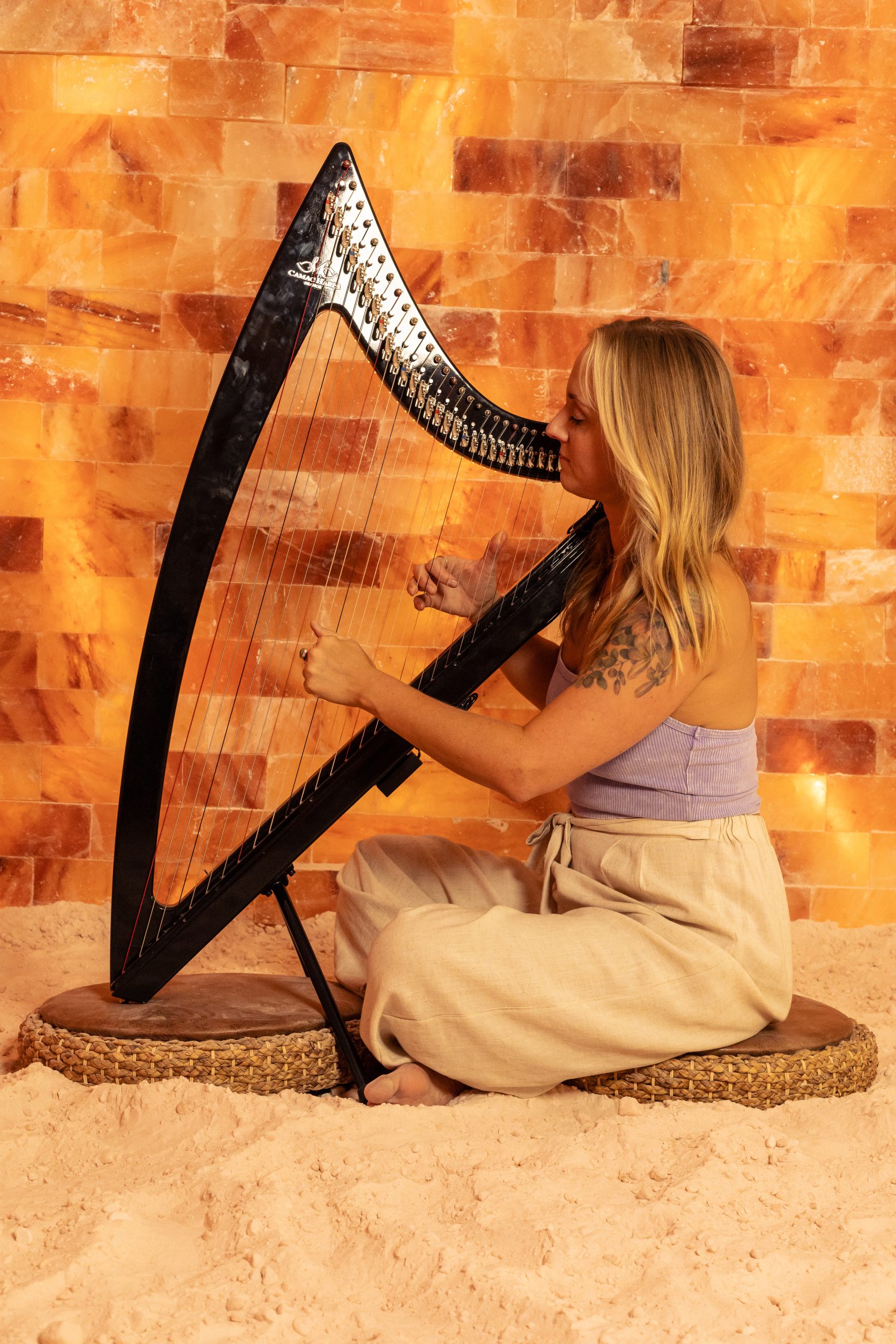 Dre Knauer Playing the harp